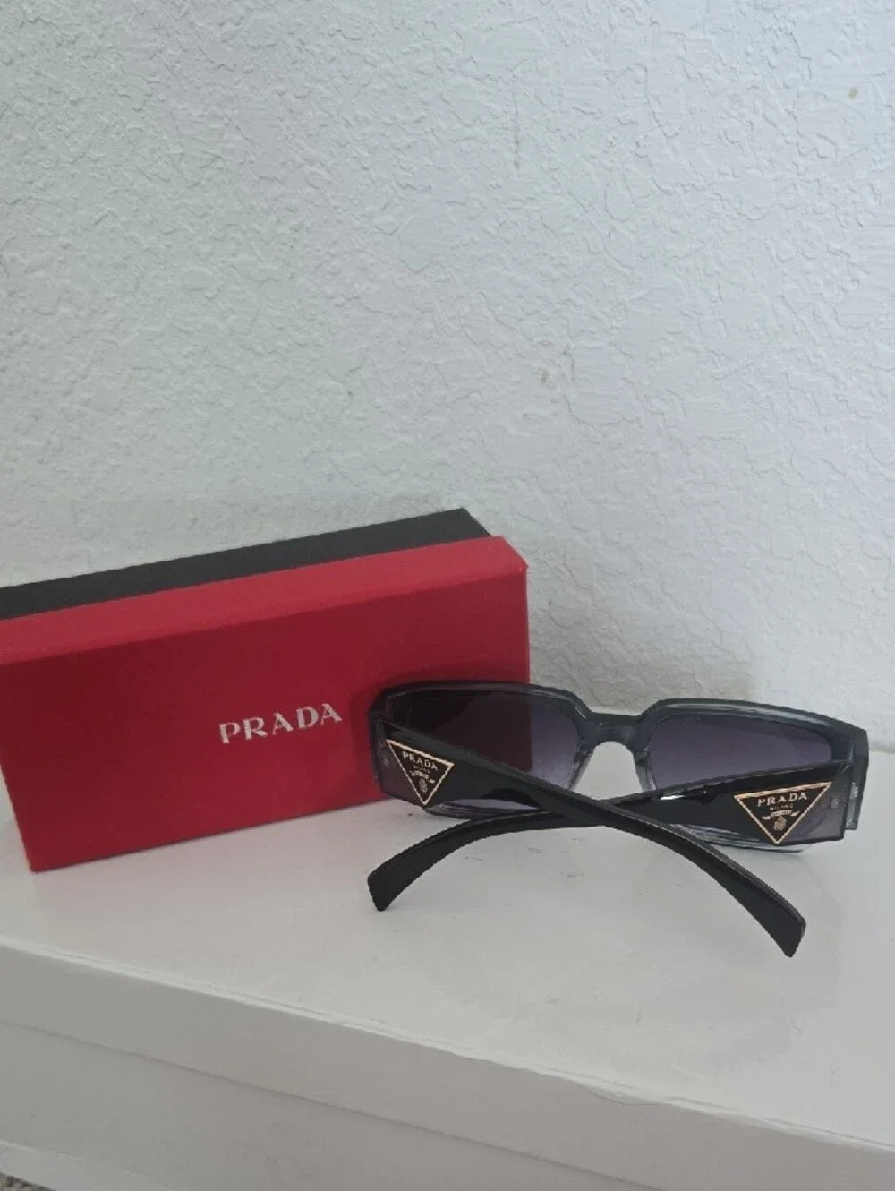 2 Pair Of Sunglasses